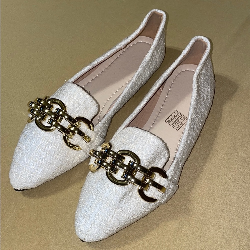 Chic White Loafers with Gold Accents